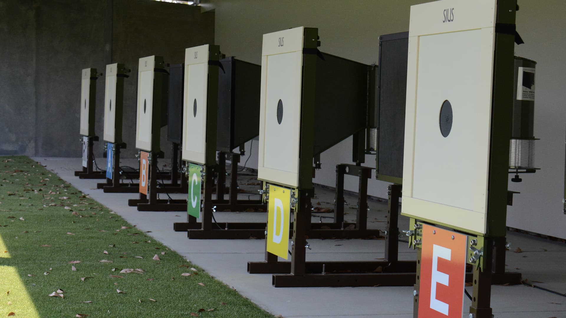 Six targets from Belmont Shooting Centre lined up in a row