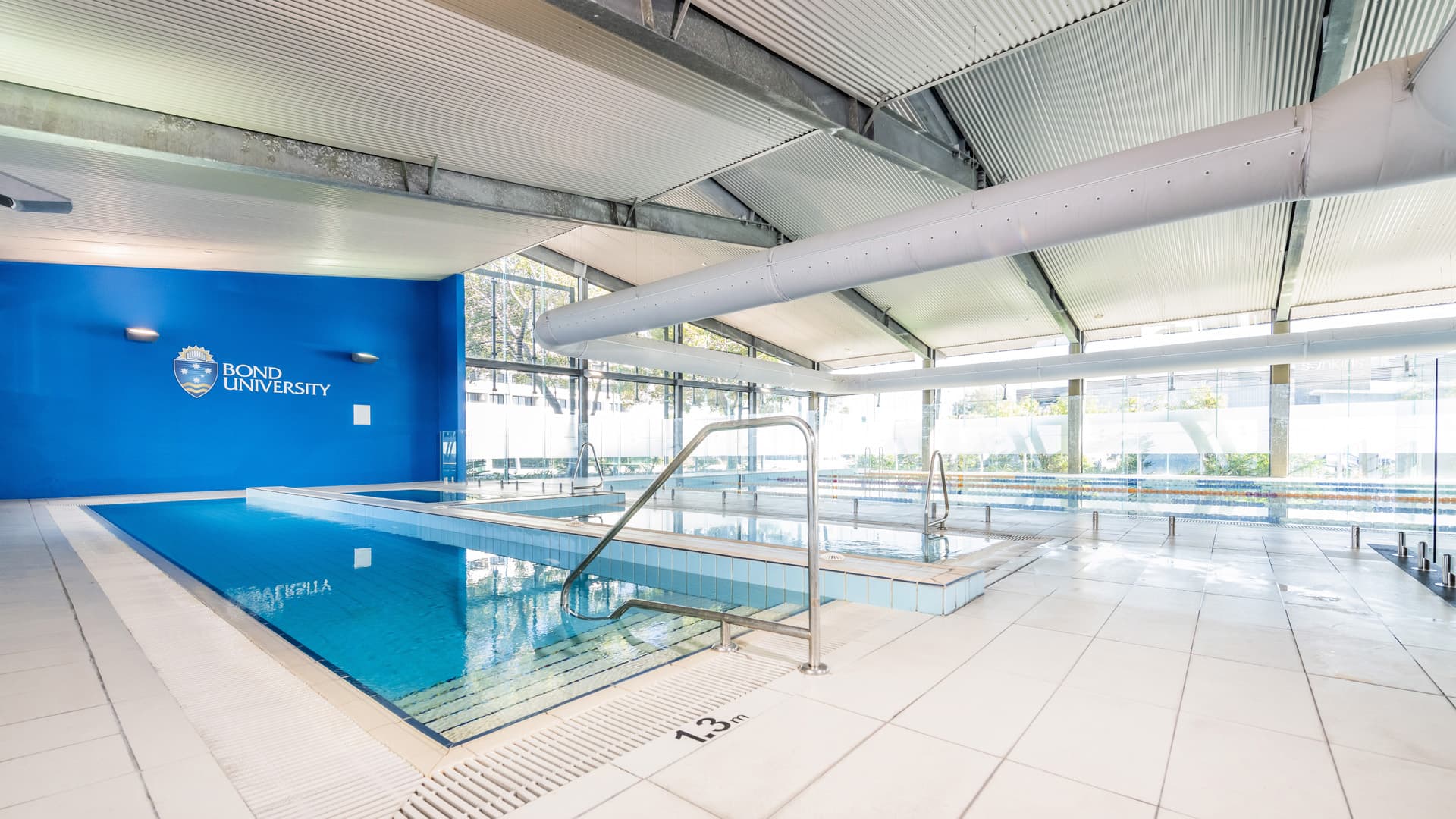 A wide angle view of Bond University indoor swimming and recovery pools.