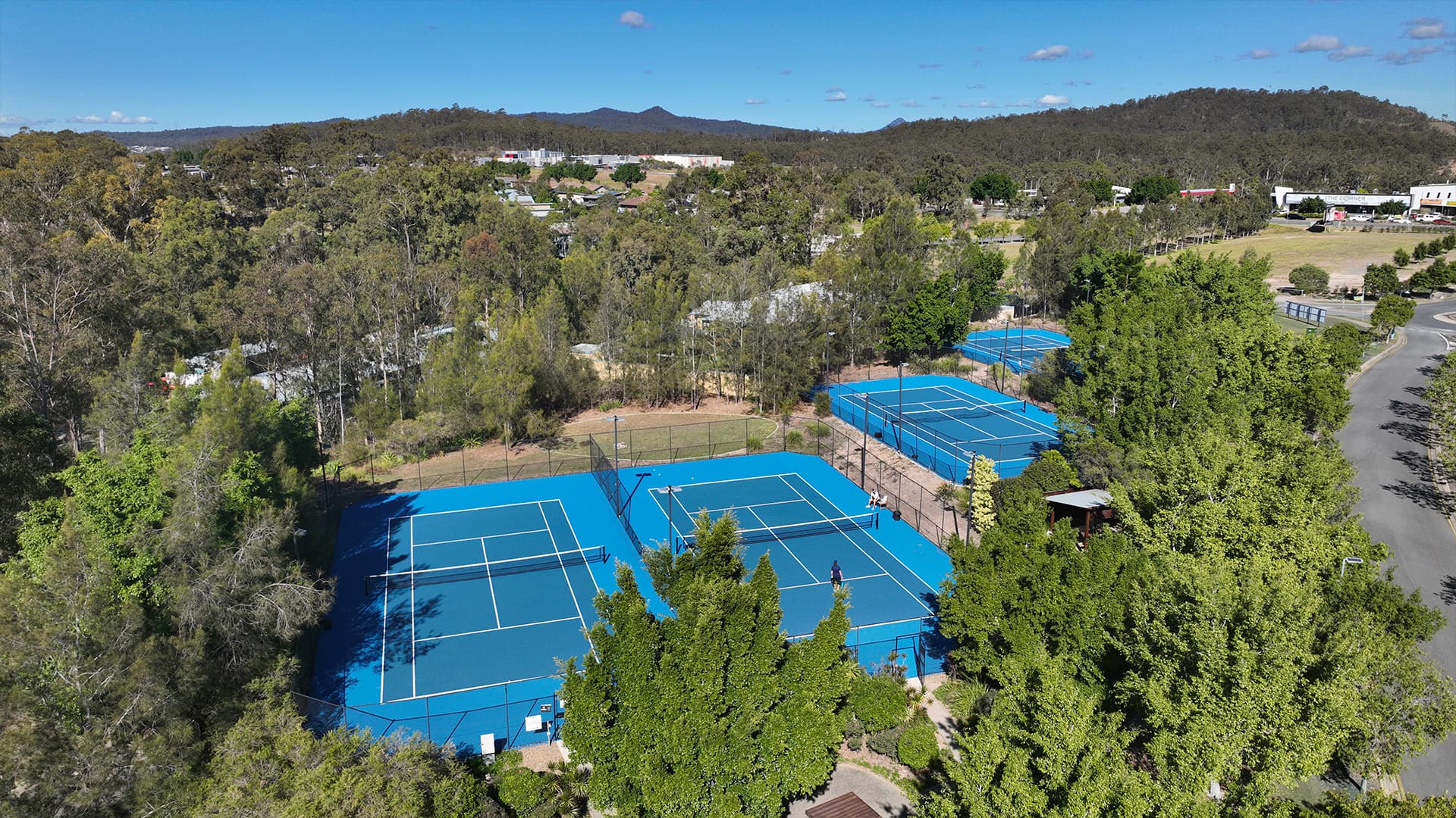 An aerial view of the tennis courts at Brookwater Golf and Country Club.