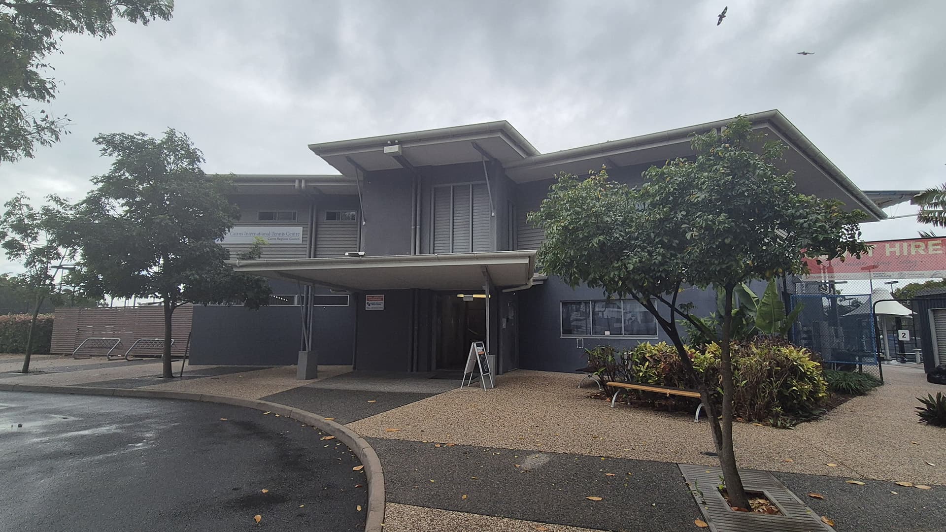 Exterior view of the entrance to the Cairns International Tennis Centre.