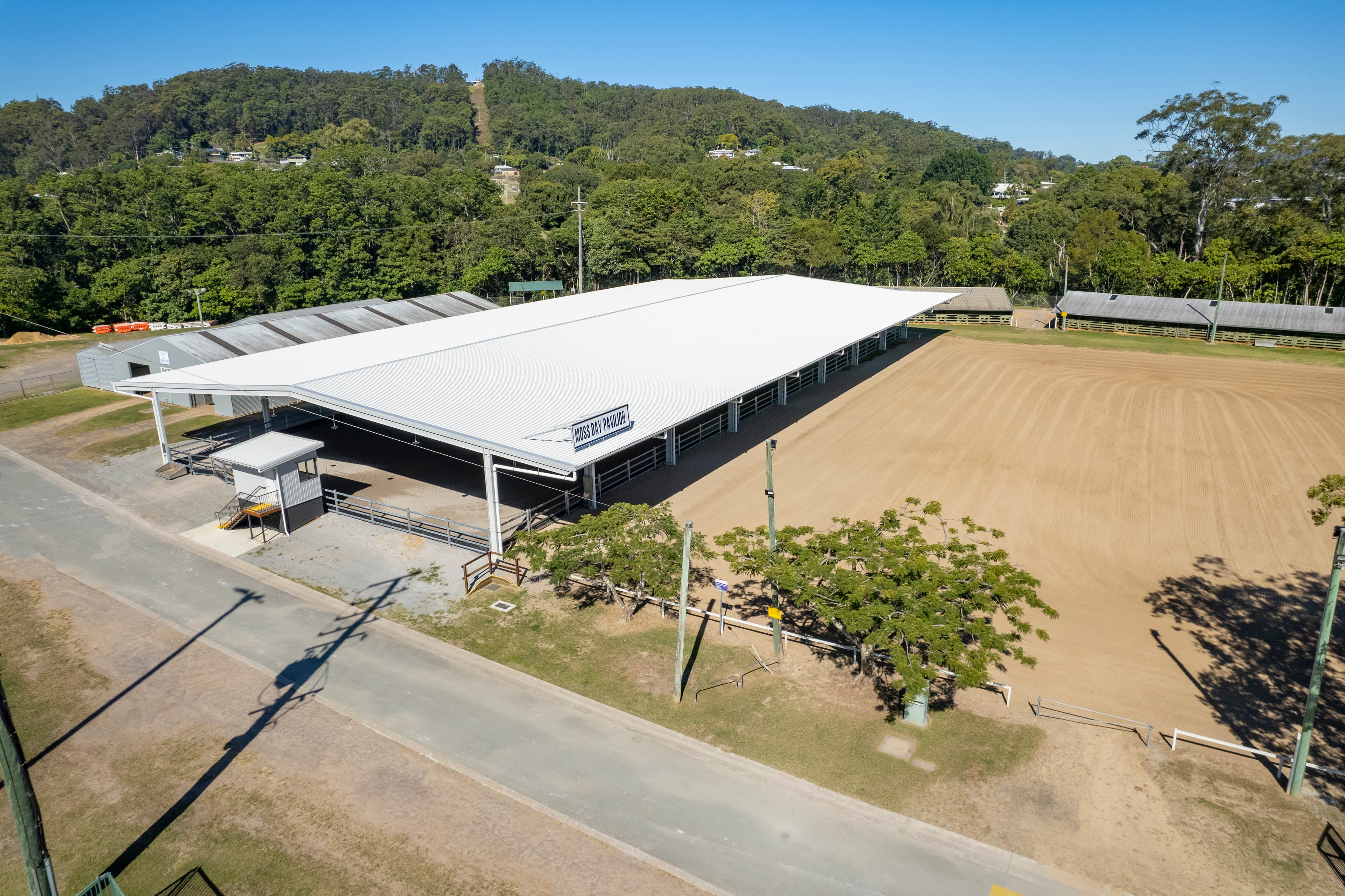 Aerial view of Moss Day Pavilion and outside sand arena at Nambour Show Ground