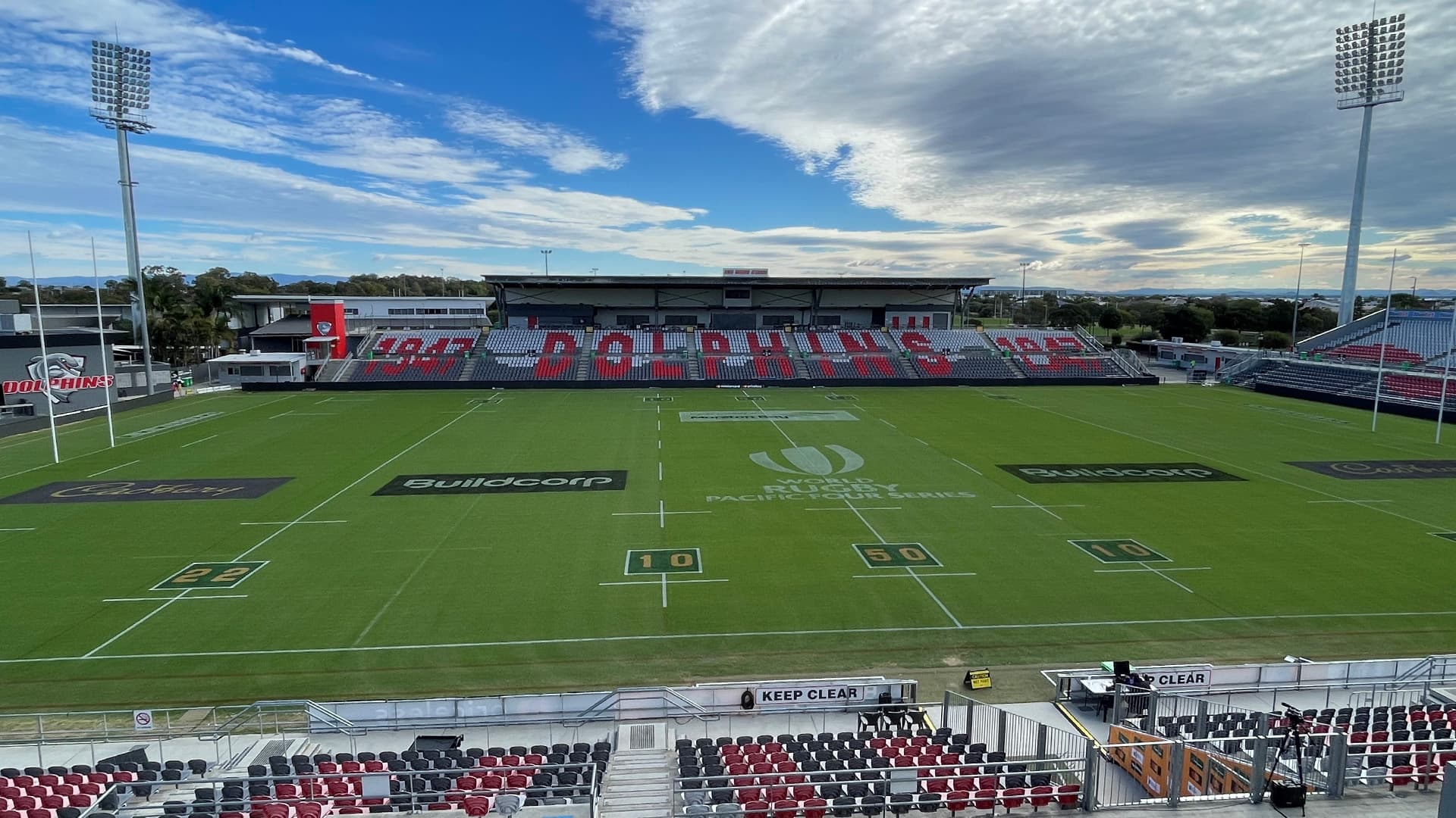 Kayo Stadium during the day with empty stands and no players on the field.