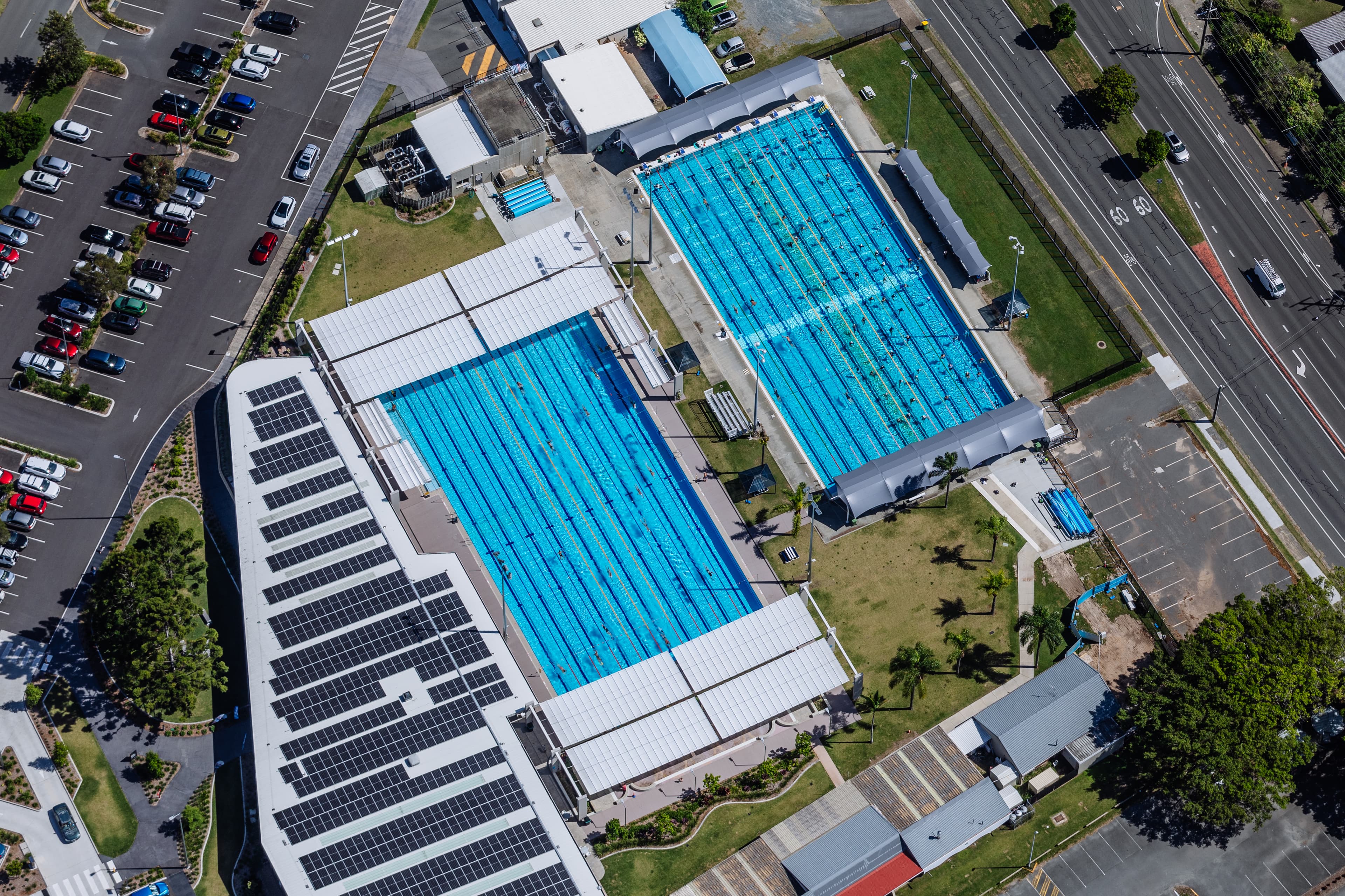 Aerial view of two 50m outdoor pools and Miami Aquatic Centre