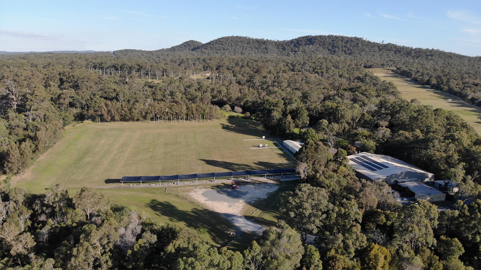 An aerial view of the archery field at Mt Petrie Bowmen with three targets at the right end of the field.