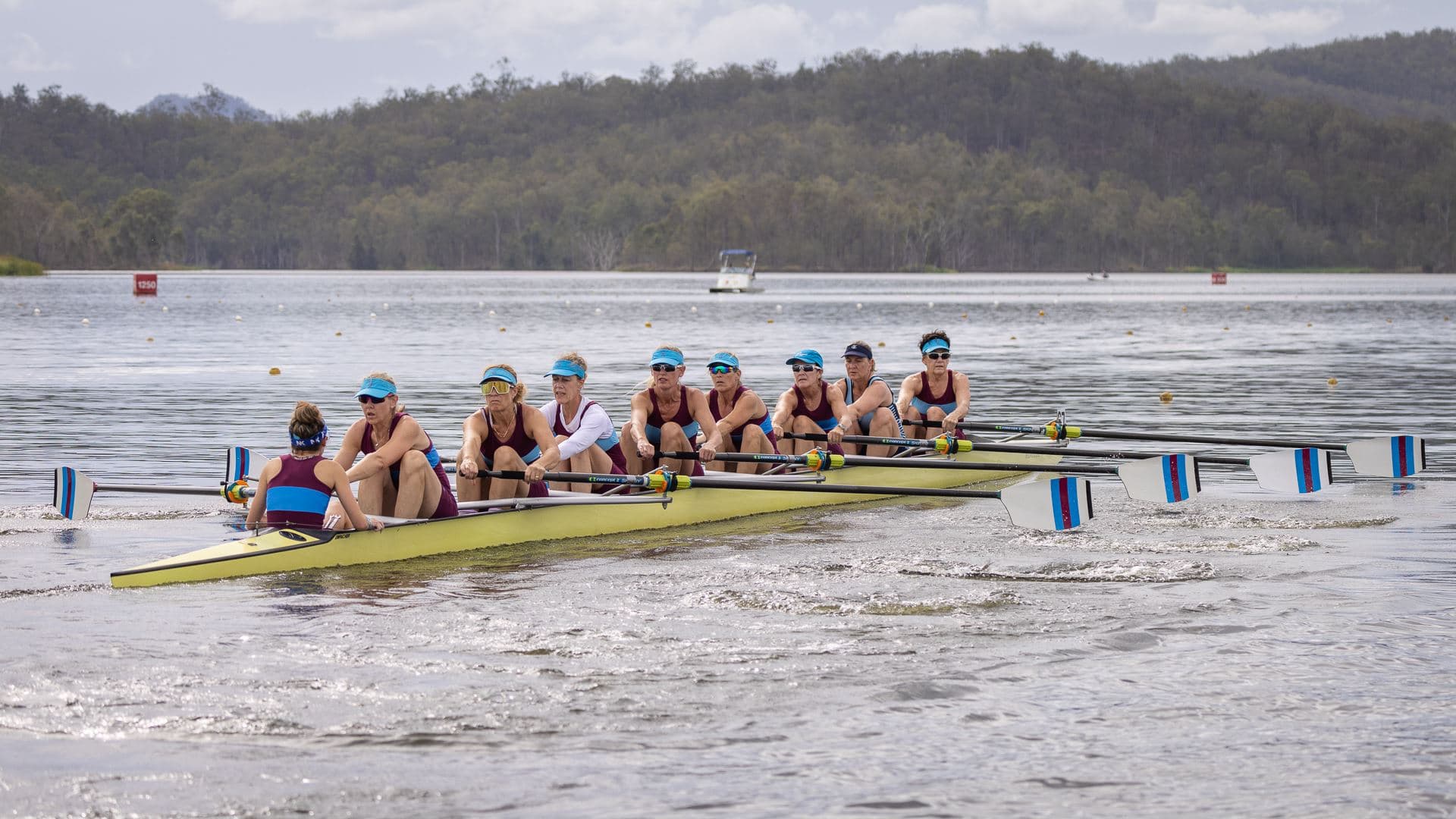 Image of a women's 8-person boat at the Queensland State Rowing Centre