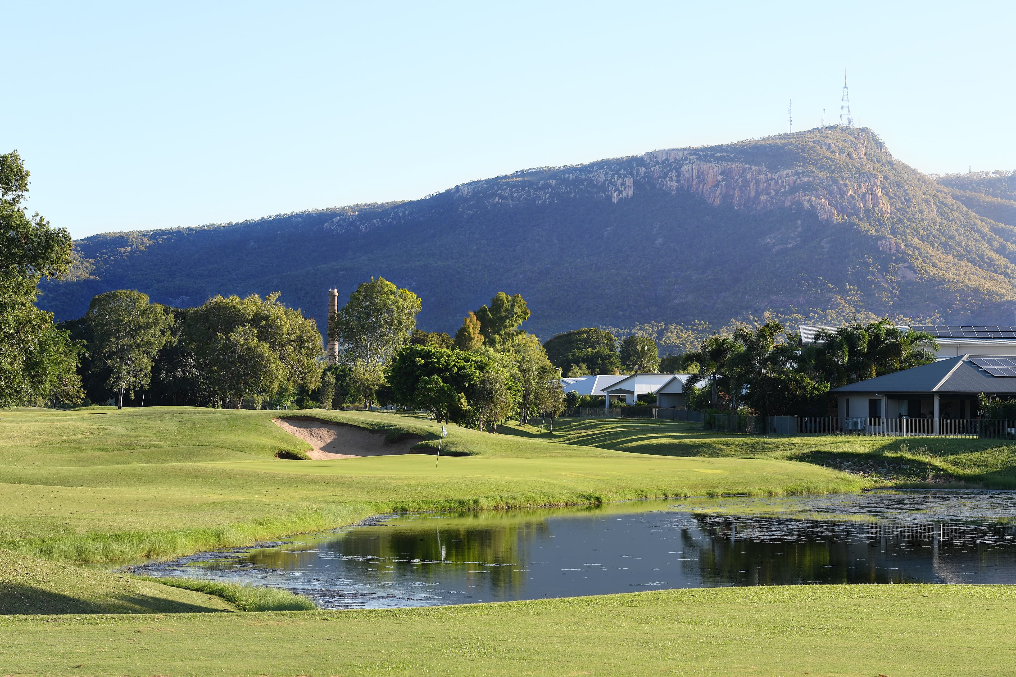 Fairways on the Townsville Golf Club with mountains in the distance